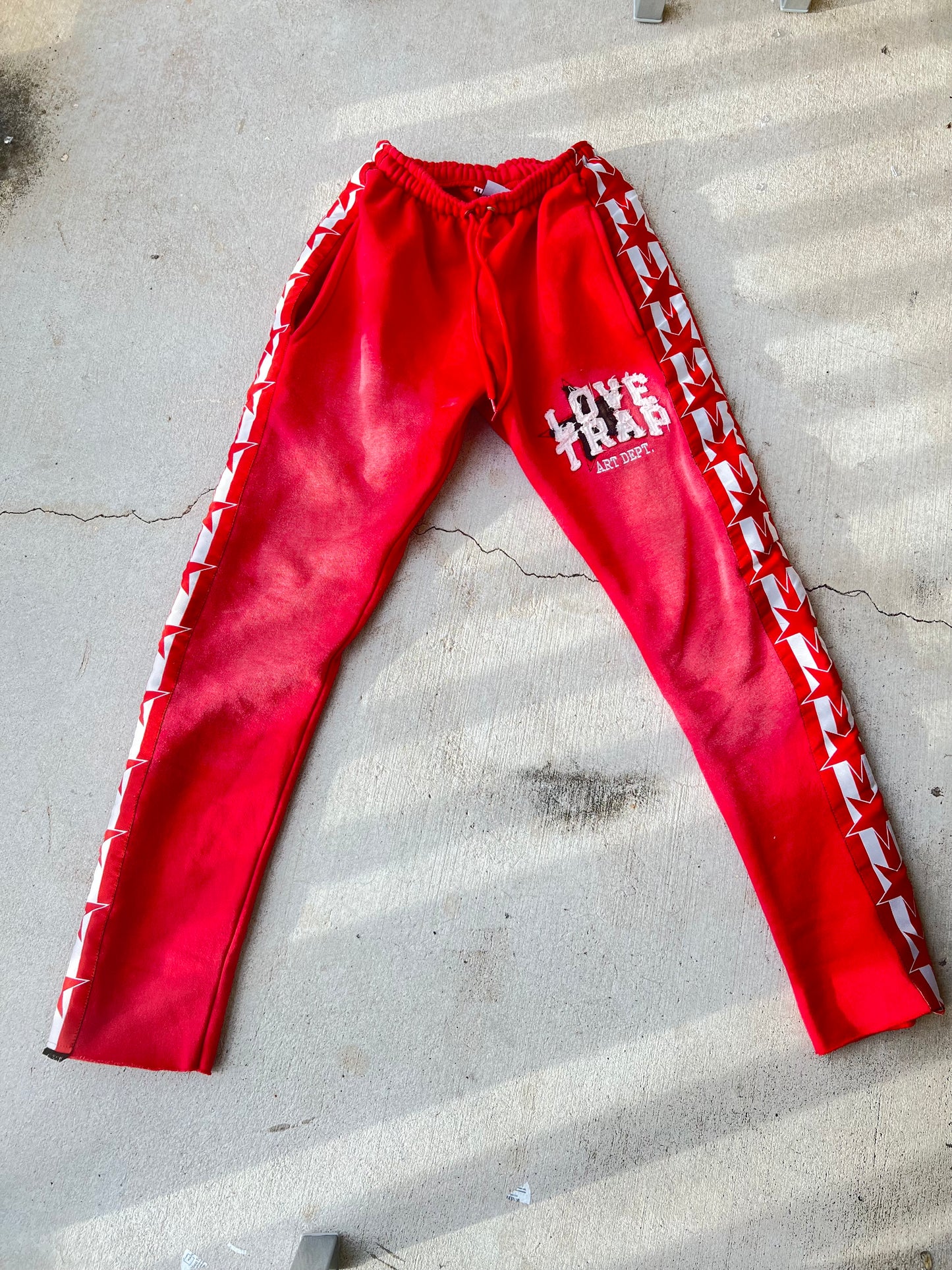 RED “LT ART DEPT.” PANTS